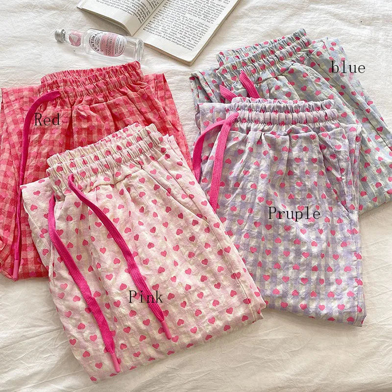 Comfortable home-style heart-printed pajama pants 2025 new casual family pants. The pink pants can be worn as a coat
