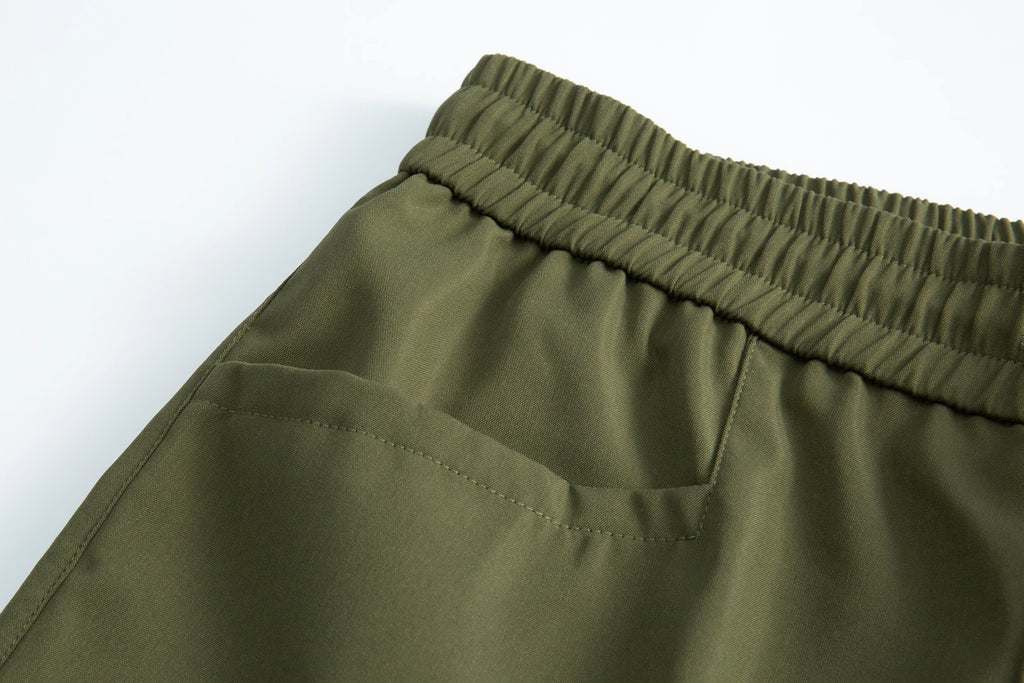 Men's sportswear pants are simple, versatile, retro and fashionable with large pleated pockets for outdoor work