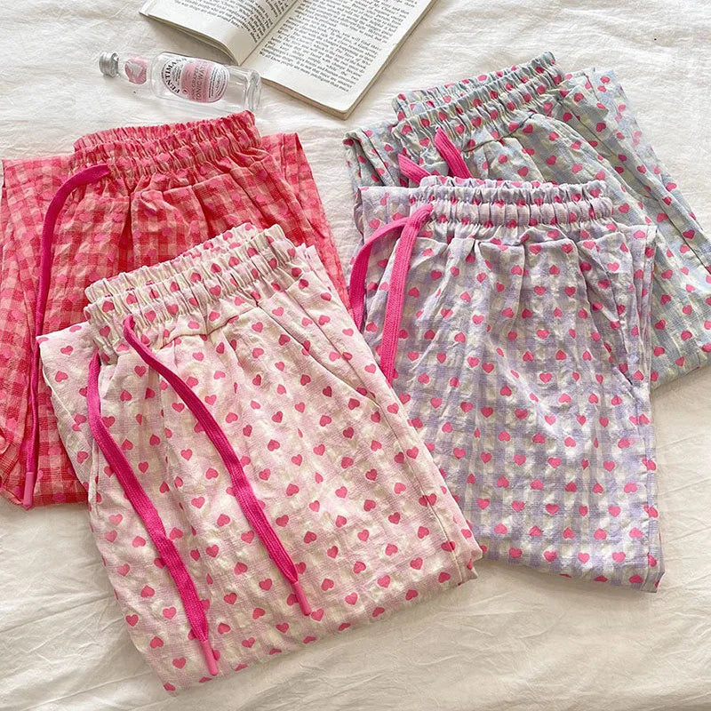 Comfortable home-style heart-printed pajama pants 2025 new casual family pants. The pink pants can be worn as a coat