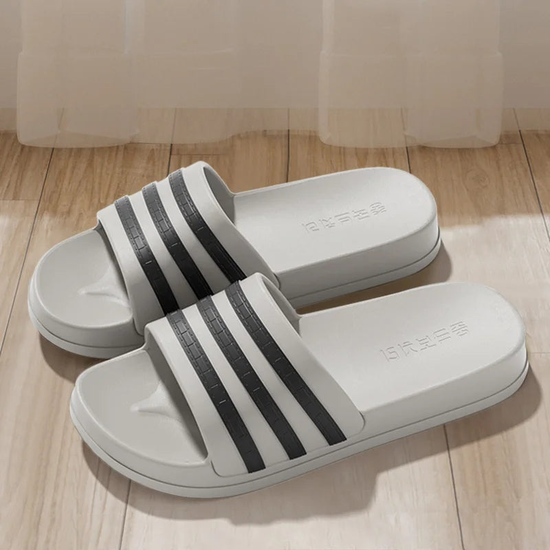 Cold slippers for women in summer, fashionable outerwear for couples, thick soled, non slip, one line mop, bathroom slippers