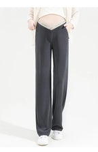 Pregnant woman's pants - Outerwear for autumn and winter: Wide-leg pants, nine-inch length, straight shape, with drawstrings.