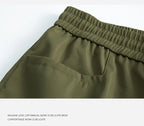 Men's sportswear pants are simple, versatile, retro and fashionable with large pleated pockets for outdoor work