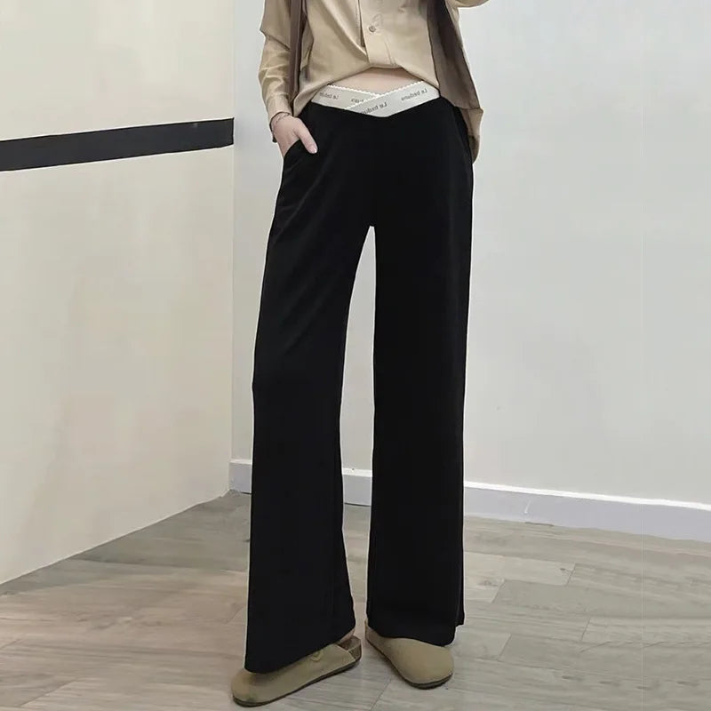 Pregnant woman's pants - Outerwear for autumn and winter: Wide-leg pants, nine-inch length, straight shape, with drawstrings.