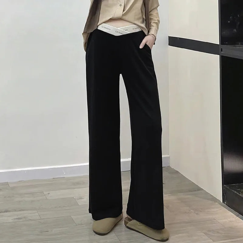 Pregnant woman's pants - Outerwear for autumn and winter: Wide-leg pants, nine-inch length, straight shape, with drawstrings.