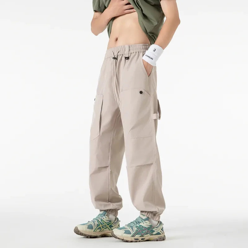 Men's outfit pants are versatile, trendy, loose, straight-leg outdoor work pants and trendy brand tight-fitting windbreakers