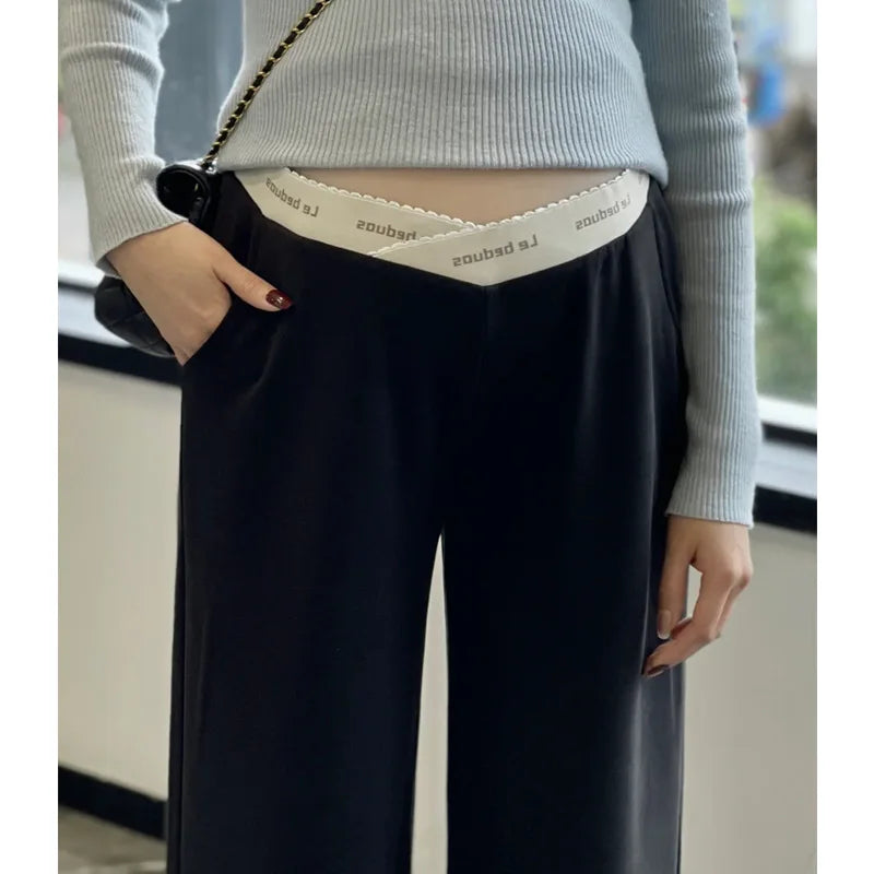 Pregnant woman's pants - Outerwear for autumn and winter: Wide-leg pants, nine-inch length, straight shape, with drawstrings.
