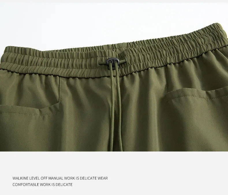 Men's sportswear pants are simple, versatile, retro and fashionable with large pleated pockets for outdoor work