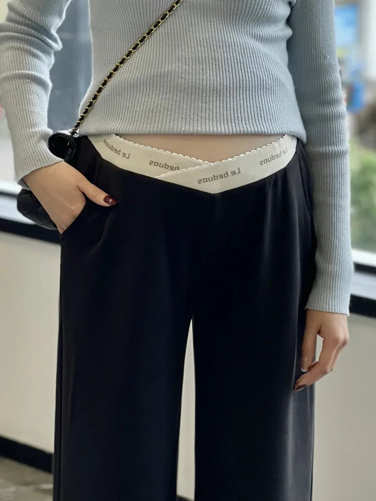 Pregnant woman's pants - Outerwear for autumn and winter: Wide-leg pants, nine-inch length, straight shape, with drawstrings.